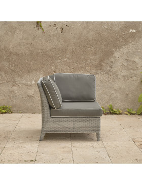 Oceane corner piece . French grey rattan on a southern French terrace. Pictured from the side with backrest on the left