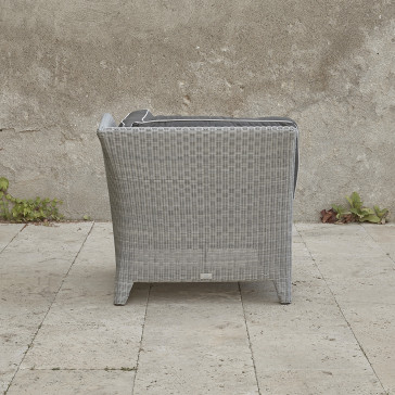 Oceane corner piece . French grey rattan on a southern French terrace. Pictured from the back