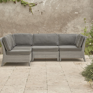 Oceane modular set showing three corners and two middle seats French grey rattan on Southern French terrace.