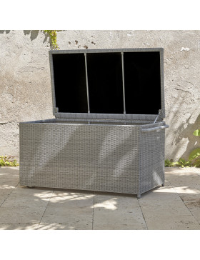 Rattan garden storage box on a southern french terrace pictured with the lid open